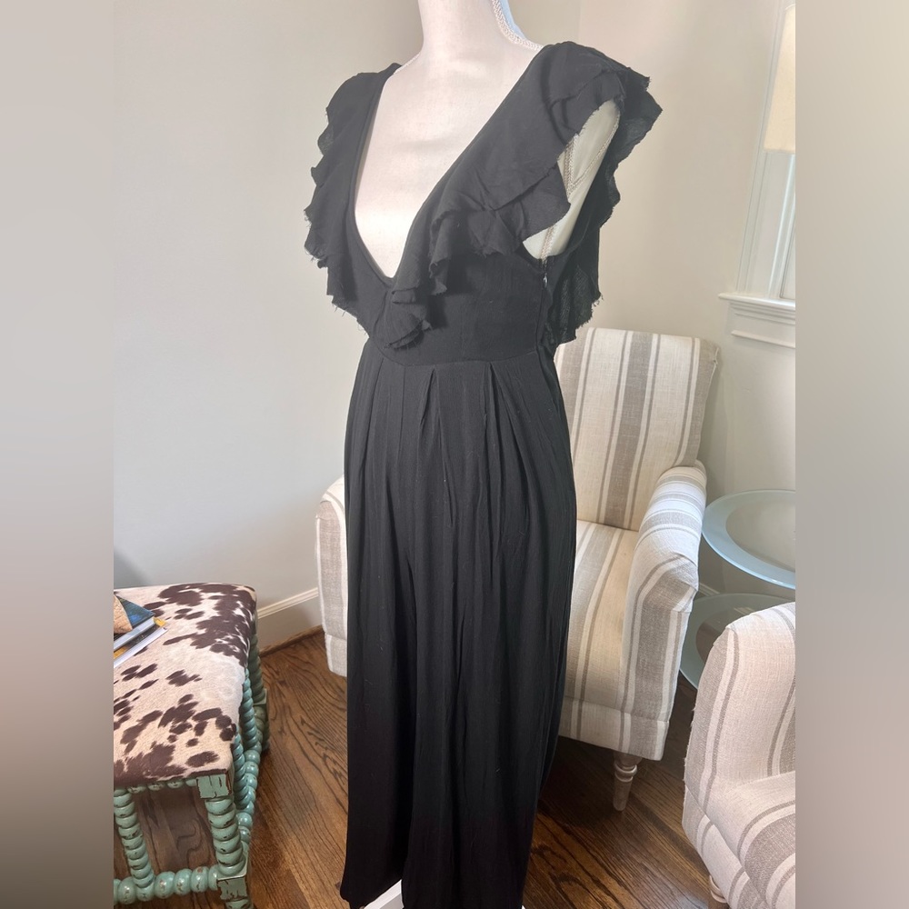 NWOT Fab’rik Black Jumpsuit with deep-v neckline and deep back